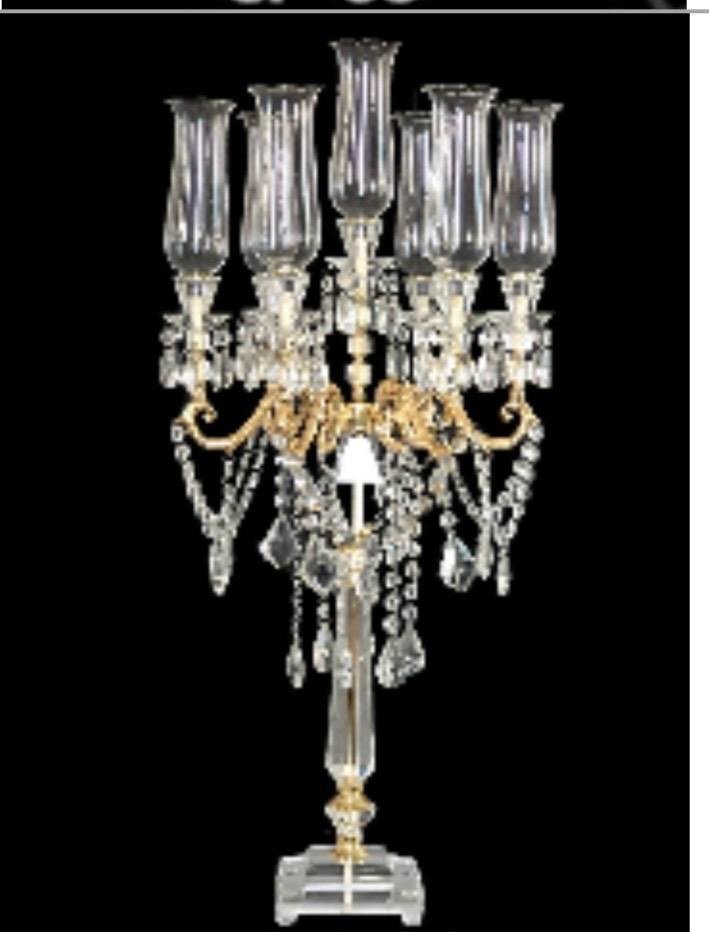 Grand crystal candelabra with hurricane globes and pearl drops