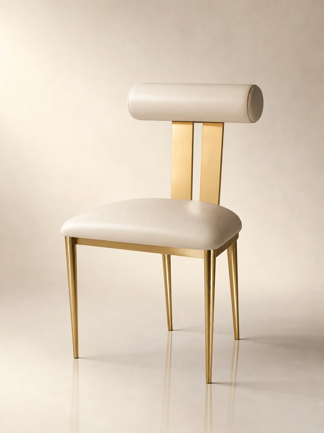 Nova chair with cream leather cushion and gold metal frame