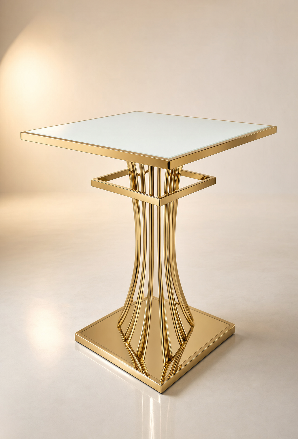 Square cake and cocktail table with sculpted gold hourglass base and white glass top