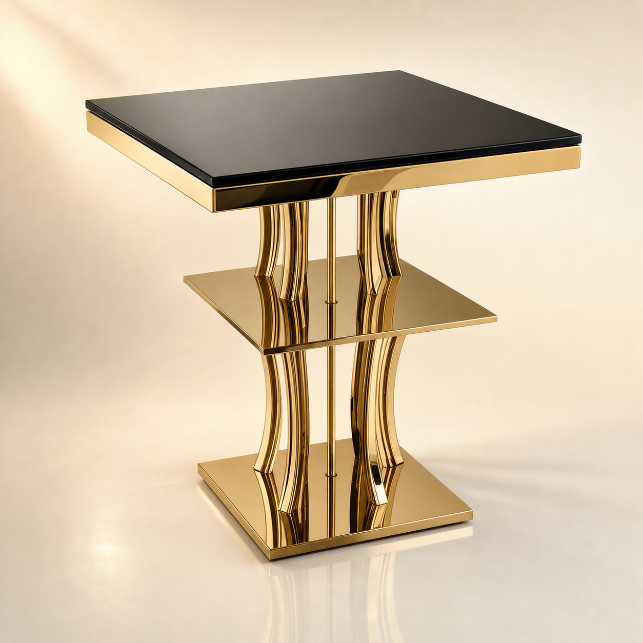 Two-tier gold and glass cocktail cake table with black glass top and sculpted pedestal