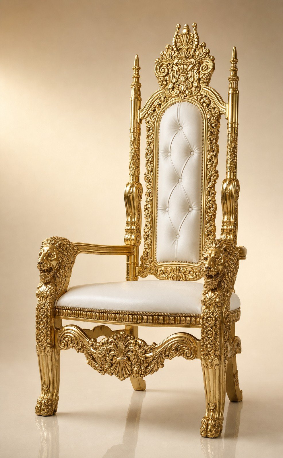 Ornate gold baroque throne chair with lion arm rests and diamond-tufted white back